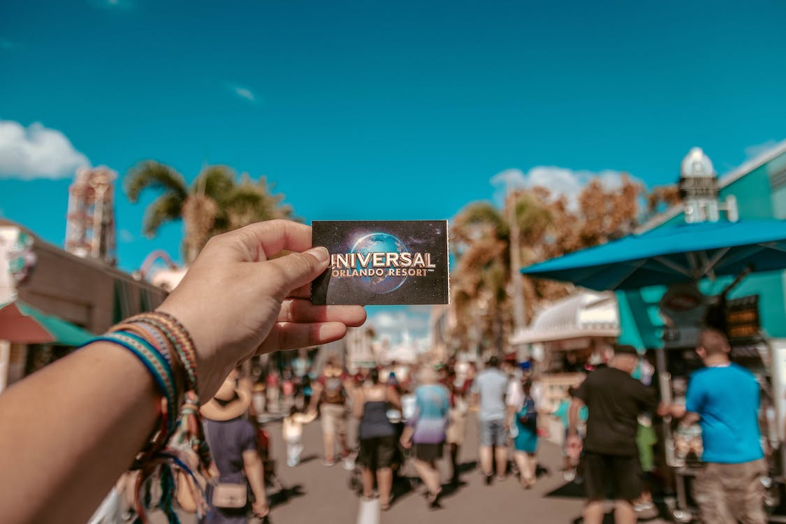 Free Person Holding Universal Studios Ticket Stock Photo