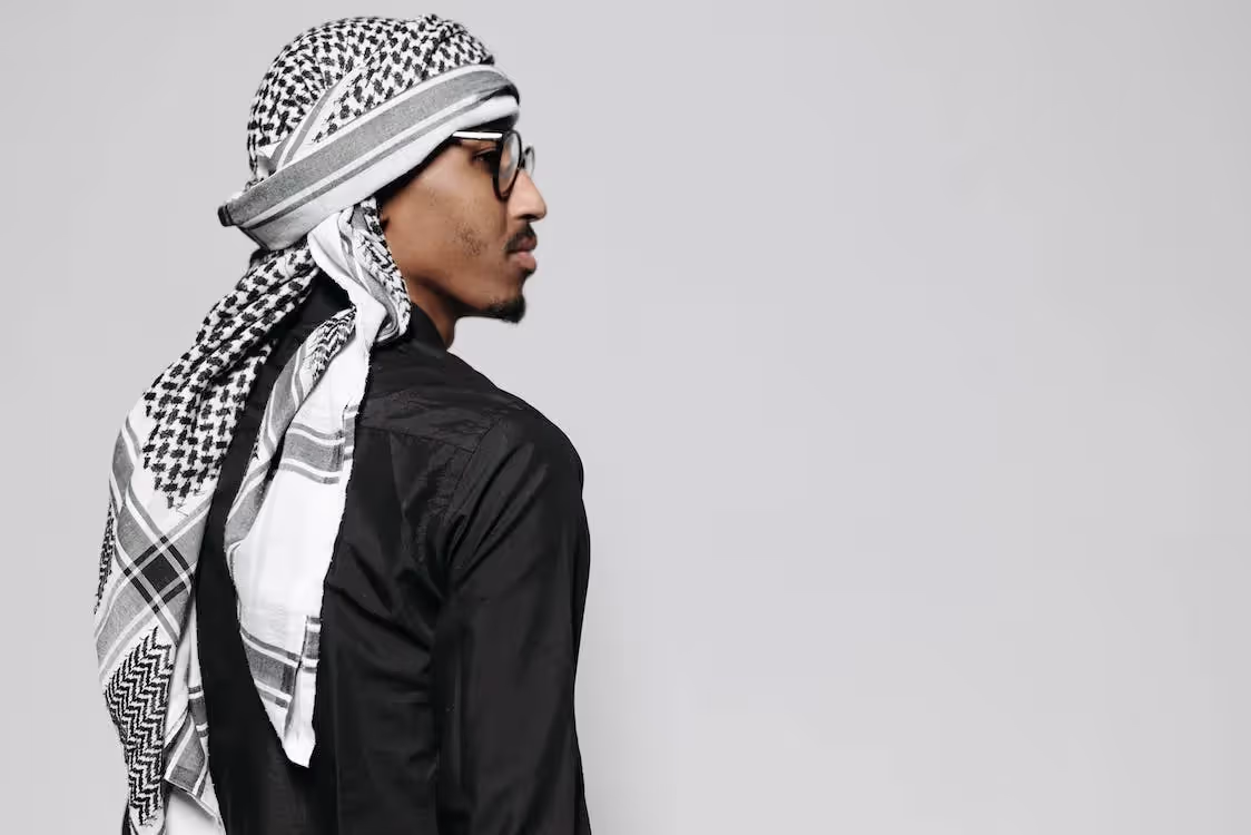 Free A Man in Black Long Sleeves Wearing a Headscarf Stock Photo