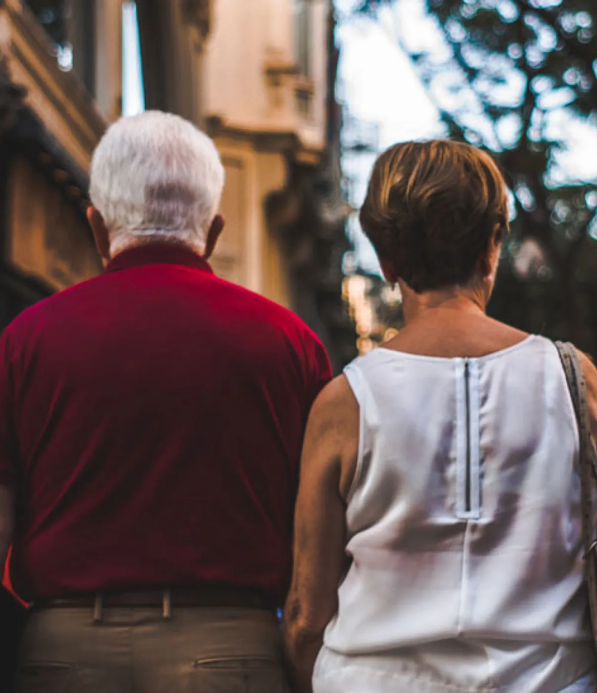 Image 8: Elder couple walking together on the street