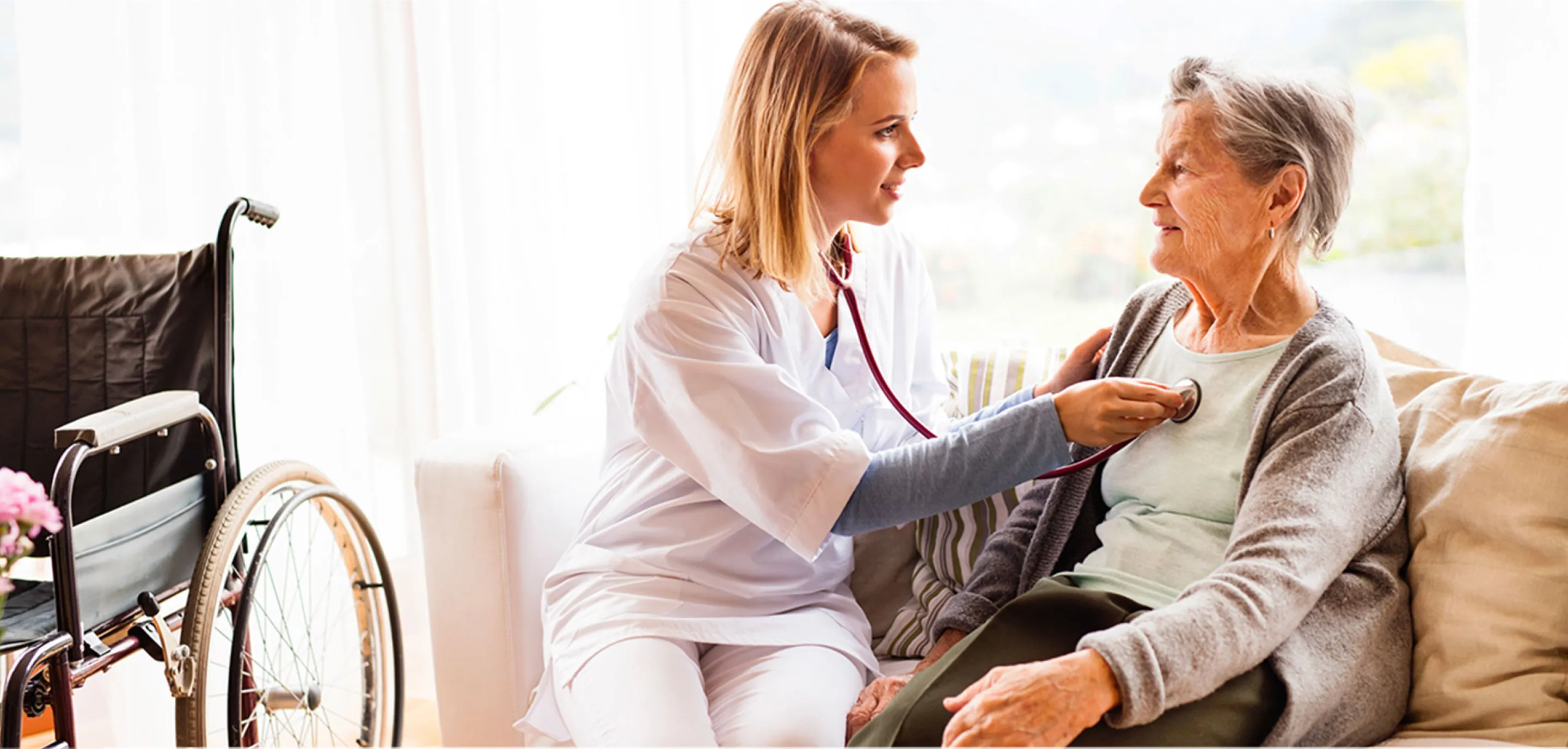 Image 9: A doctor taking care of an elder person
