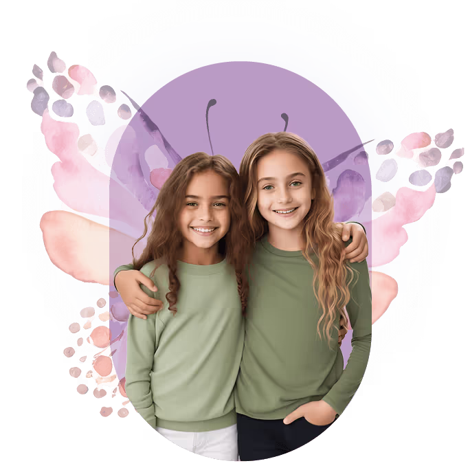 Two young girls smiling